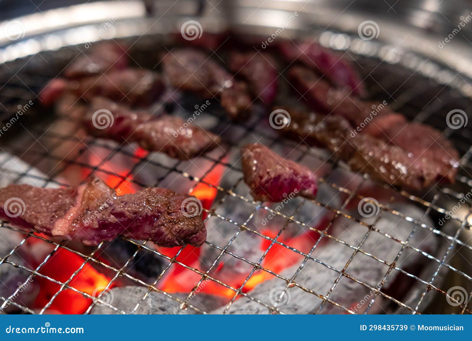 Korean Style Barbecue on Stainless Grill. Stock Image - Image of asian