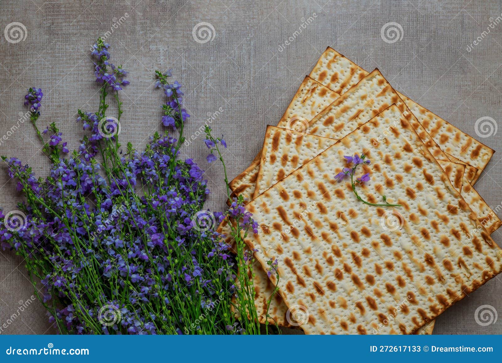 kosher matzoh with flowers for passover, traditional jewish food.