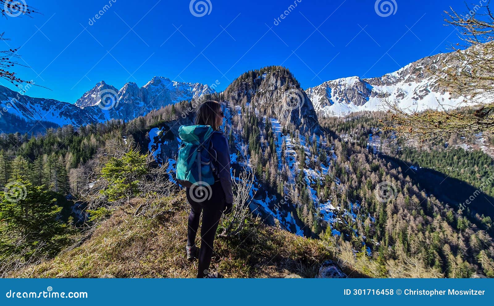 kosmatitza - hiker woman enjoying scenic view of karawanks mountain range in carinthia, austria