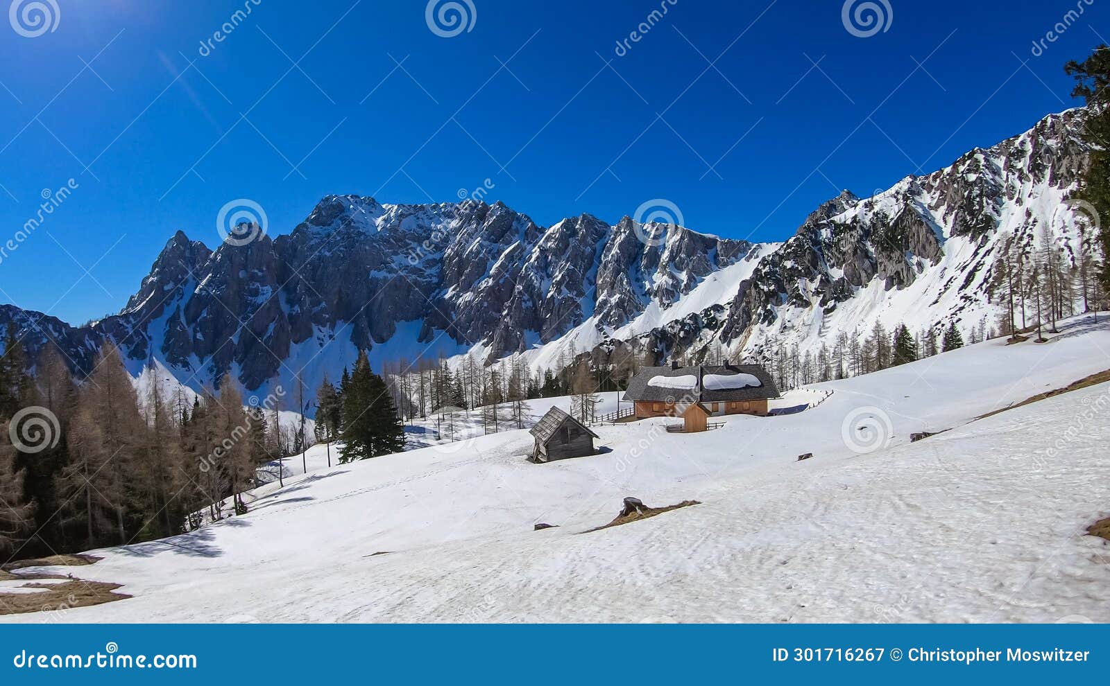 kosmatitza - snow covered ogrisalm with a panoramic view on mountain peaks in early spring