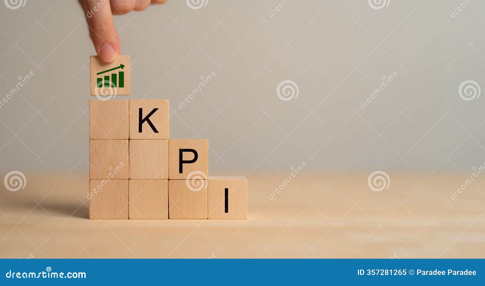kpi concept. wooden blocks with kpi icons,copy space. key performance indicator using business intelligence metrics