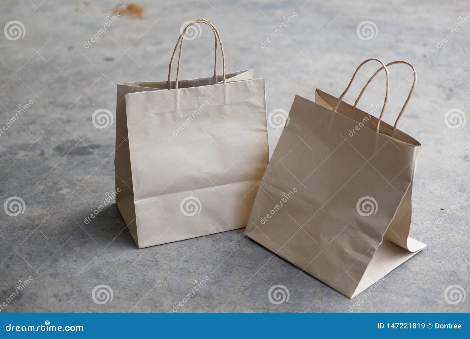 Download Kraft Paper Shopping Bags On Cement Background Stock Image Image Of Handle Closeup 147221819 Yellowimages Mockups