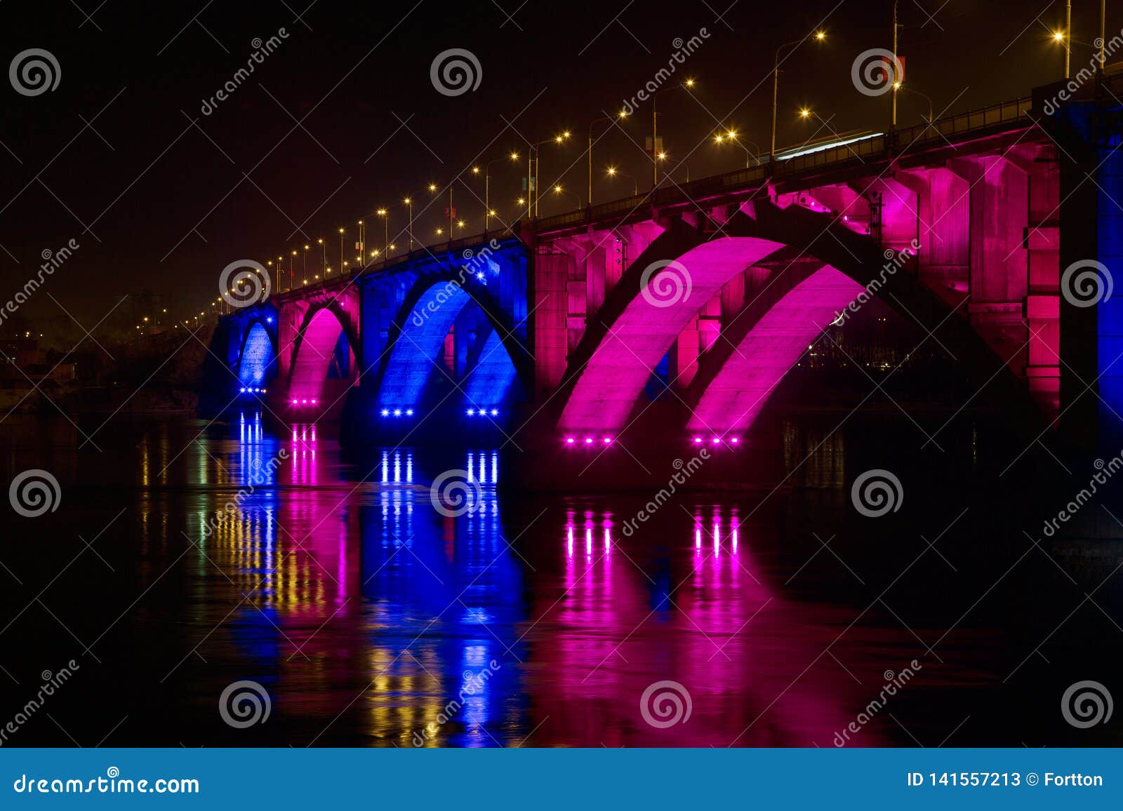 February 28, 2019 Russia, Krasnoyarsk. Night Bridge Over the Yenisei