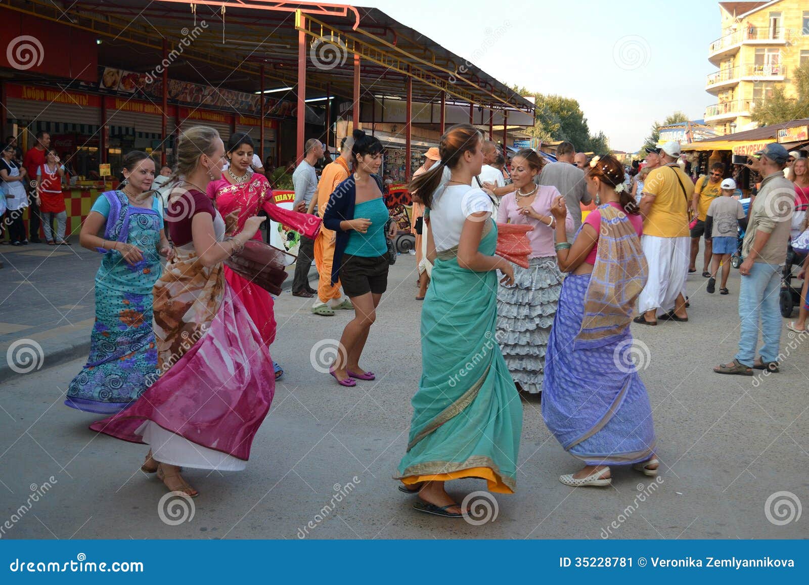 Hare Krishna singings march through the street Stock Photo - Alamy