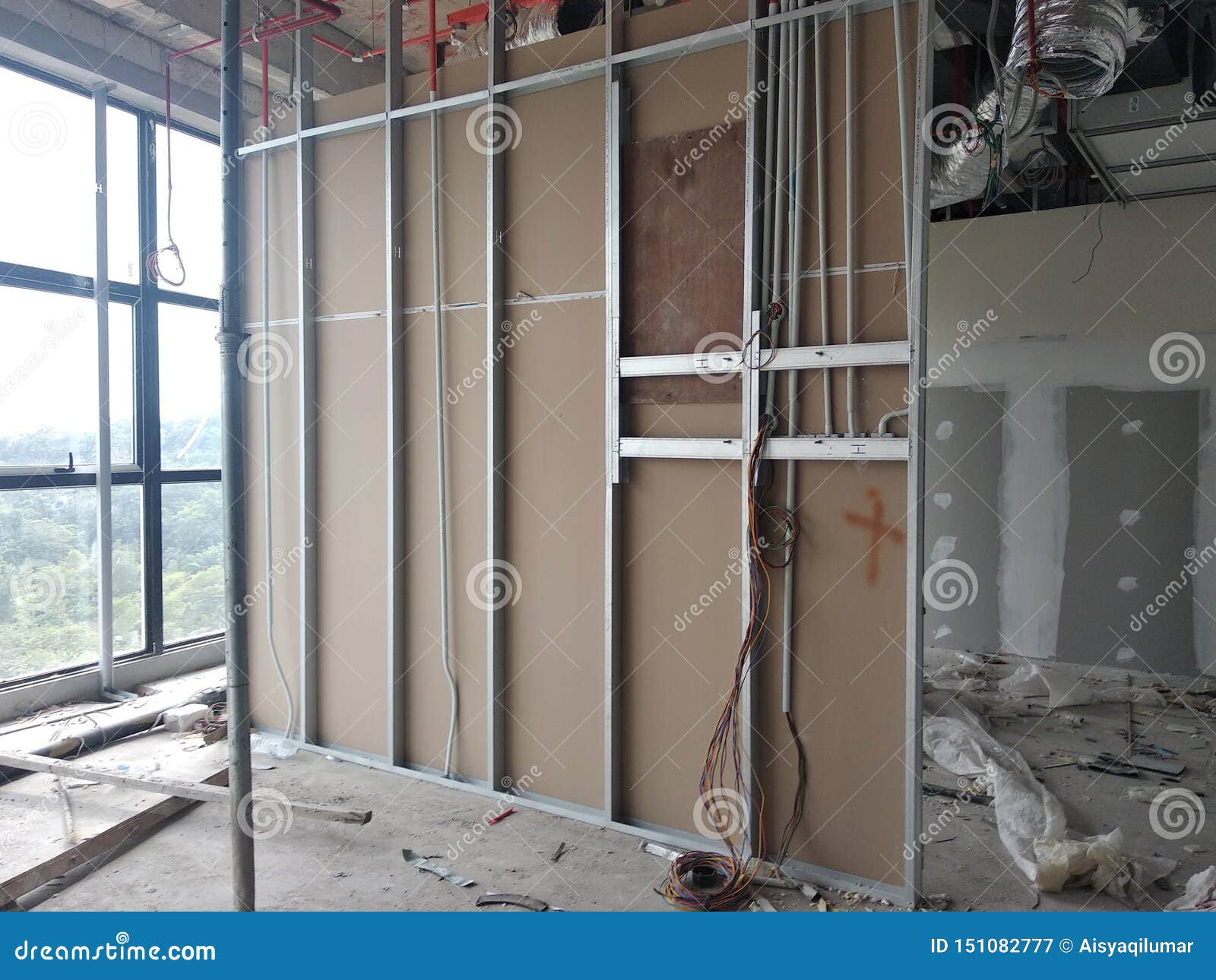 Drywall Installation Work in Progress by Construction Workers at the