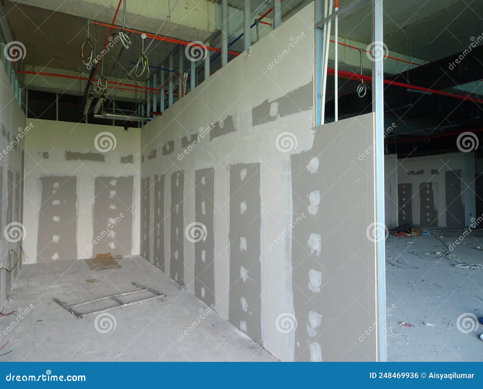 Drywall Installation Work in Progress by Construction Workers at the