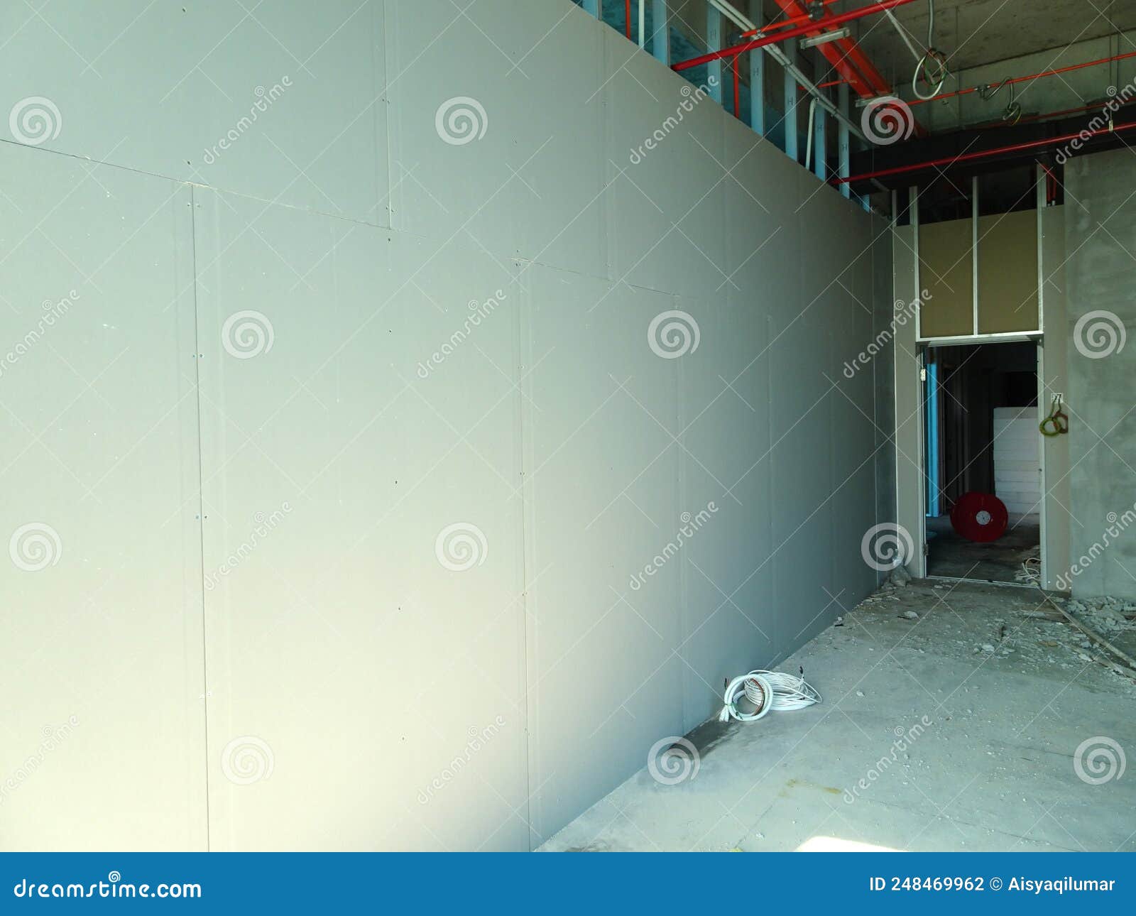 Drywall Installation Work in Progress by Construction Workers at the