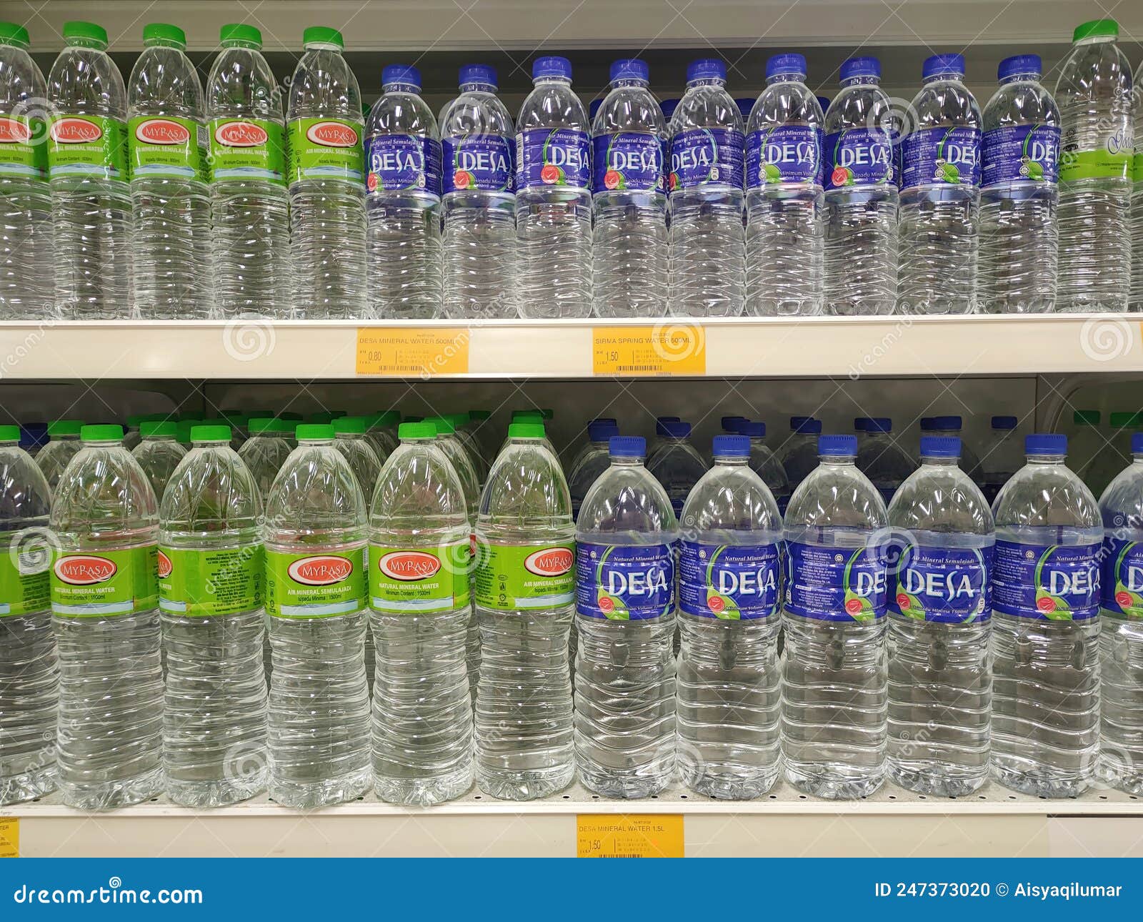 Mineral Water is Packaged in Plastic Bottles and Labeled with Various ...