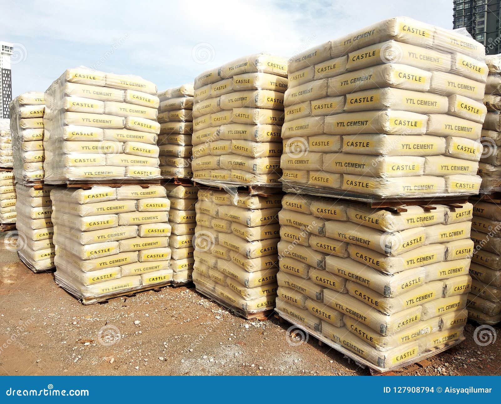 Stock Pile of Portland Cement in Commercial Bags. Editorial Stock Image