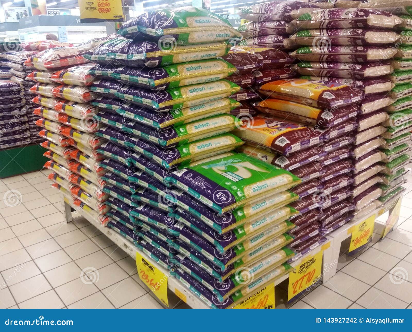 The Rice in the Plastic Packaging is Stacked Inside the Supermarket for ...