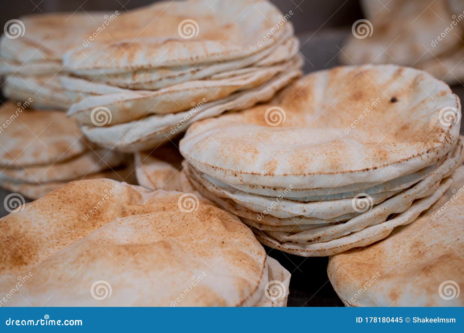 Kuboos or Khubz Fresh Pita Bread Togeather in a Table Stock Image