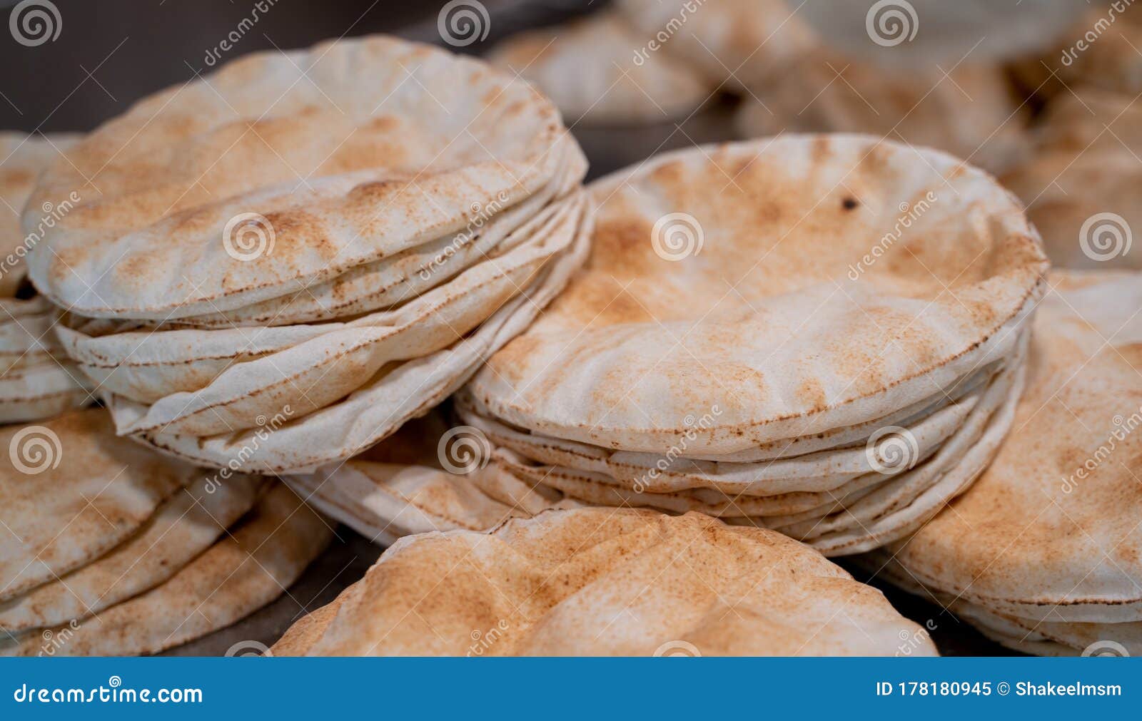 Kuboos or Khubz Fresh Pita Bread Togeather in a Table Stock Image