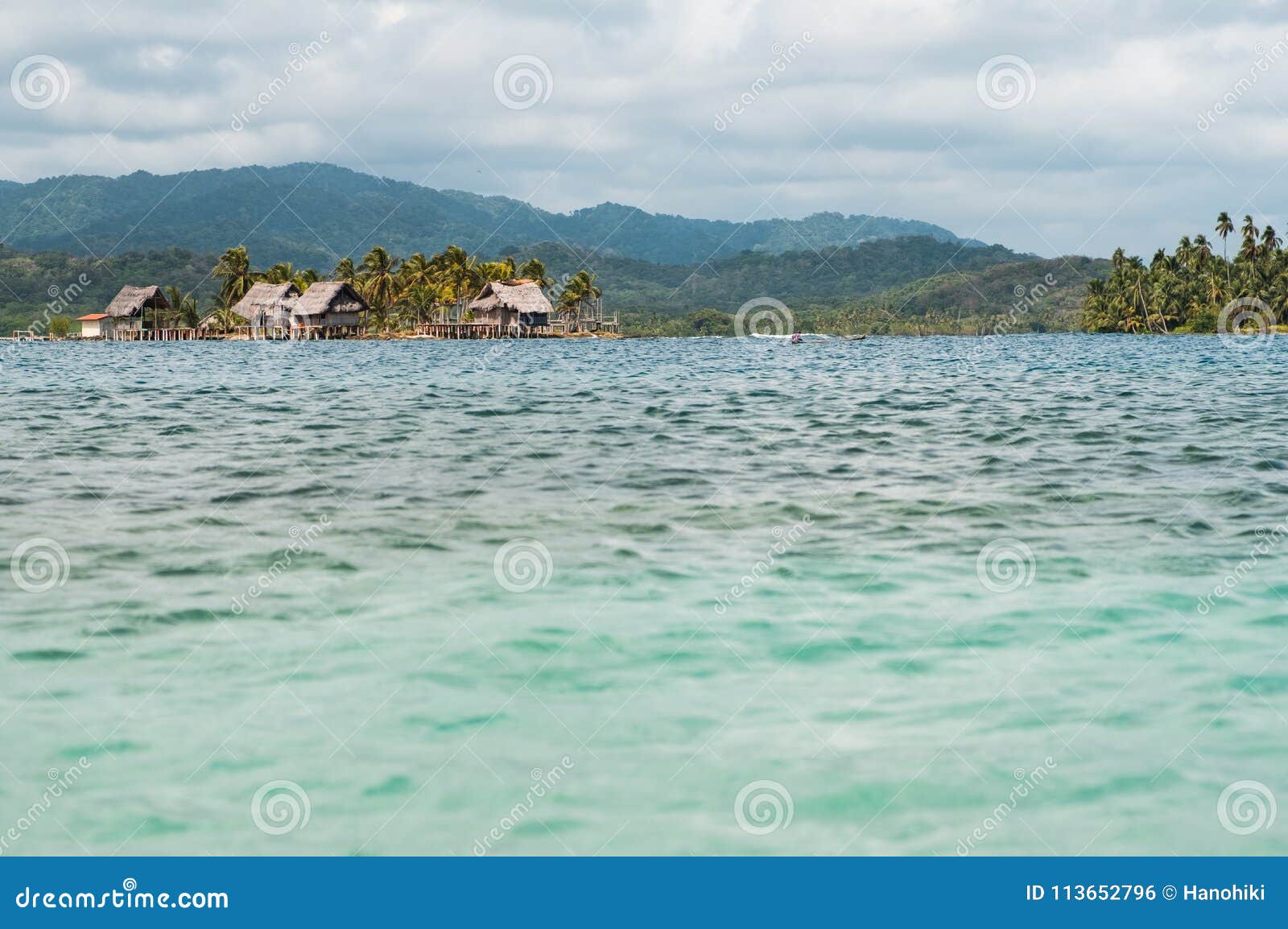 kuna village on island, wooden houses on water, guna yala, panama