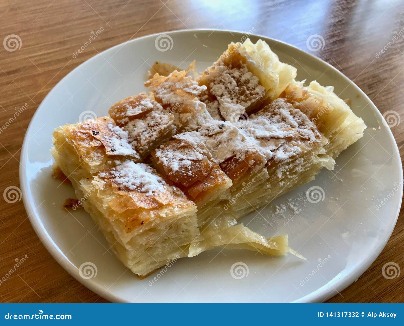kurdish pastry with caster sugar / kurt boregi / borek on plate serve