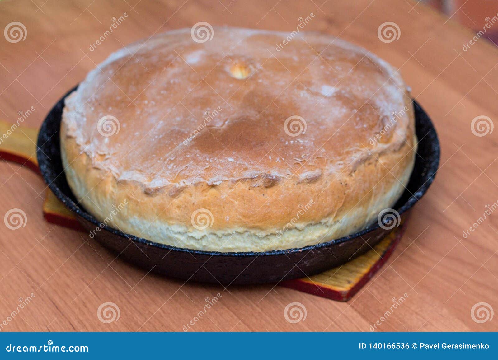 Kurnik, Russian Meat Pie. a Traditional Dish of Dough Lies in a Black Pan  on the Table Stock Photo - Image of cooking, bakery: 140166536