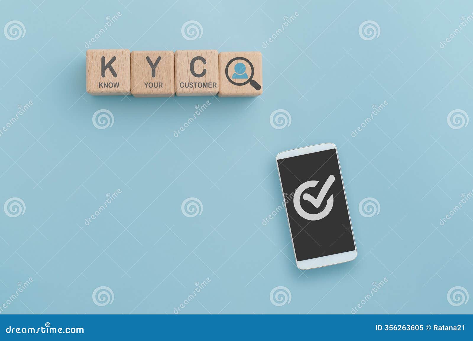 kyc, know your customer, text and man in magnifying icon on wooden cube block with approved sign on screen of smartphone, blue