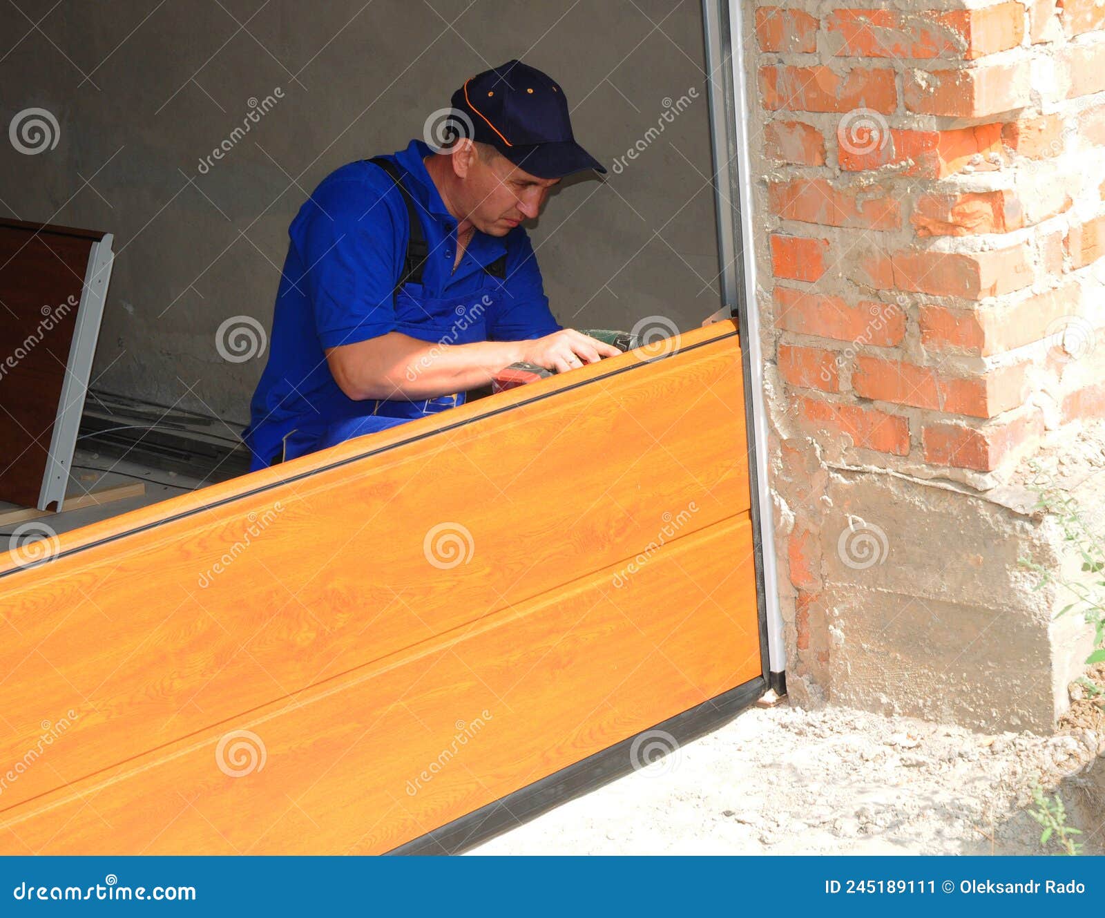 KYIV, UKRAINE MARCH, 21, 2022 Garage Sectional Door Installation. a