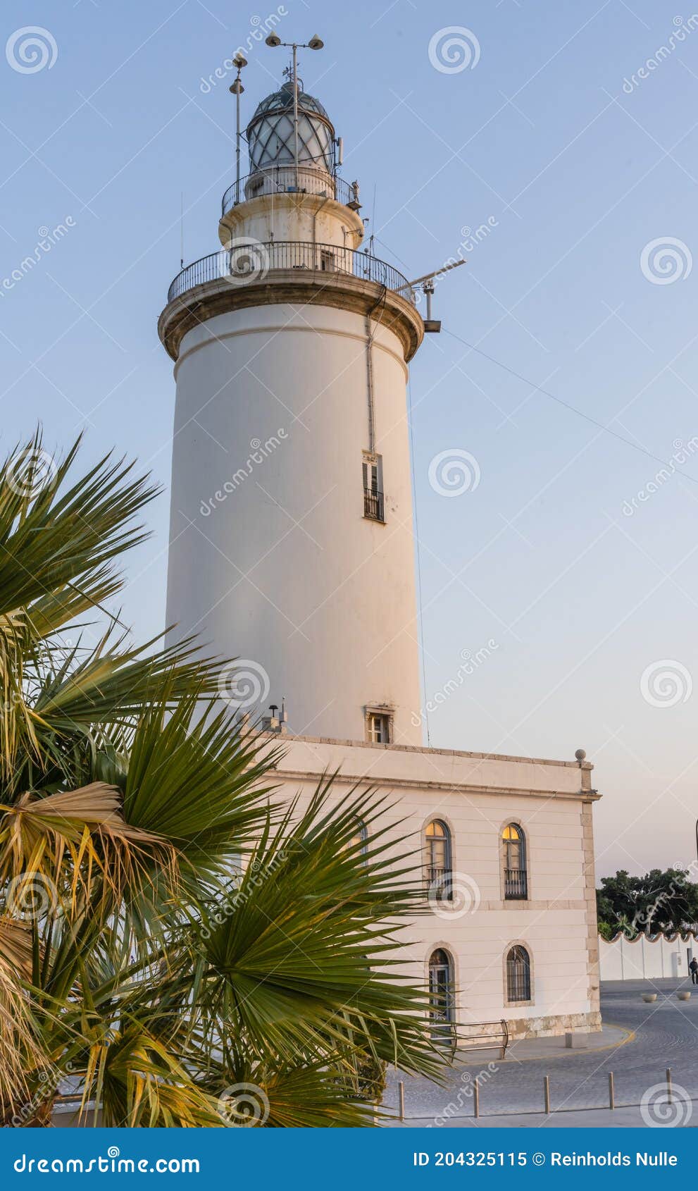 la farola de mÃÂ¡laga lighthouse on sunny summer evening