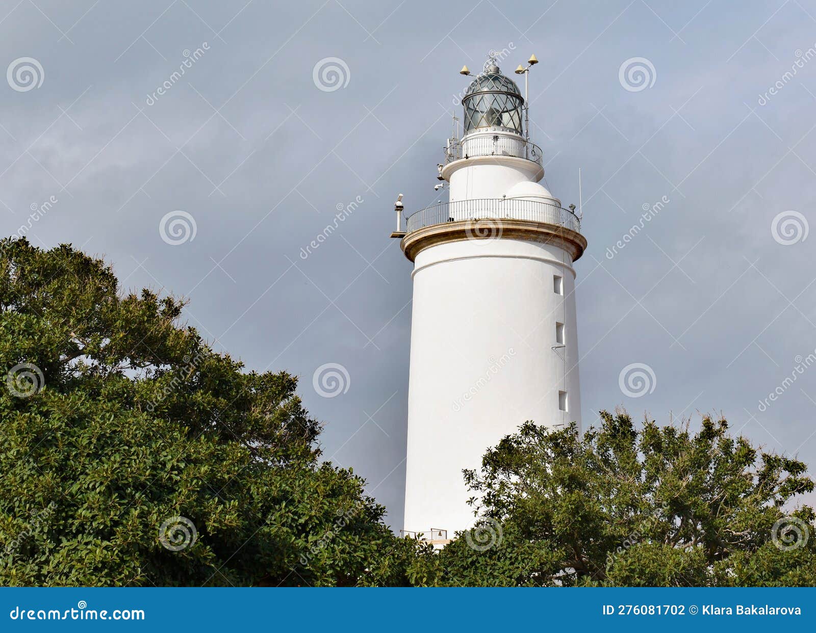 la farola lighthouse in malaga, an old coastal building in the harbour, spain