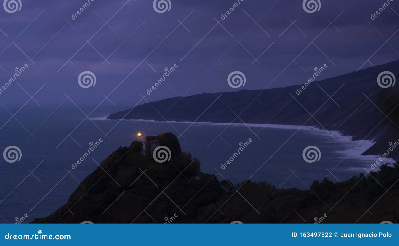 la plata lighthouse on mount ulia at dusk, in pasaia, euskadi