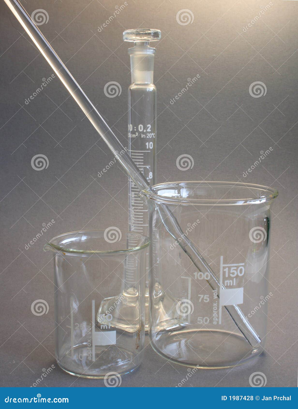 laboratory scene, the scientist holding the glass stirring rod