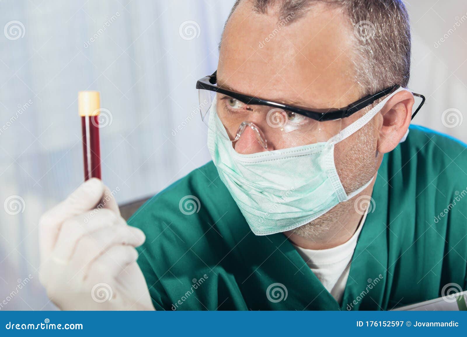 Lab Technician Assistant Analyzing a Blood Sample at Laboratory. Stock