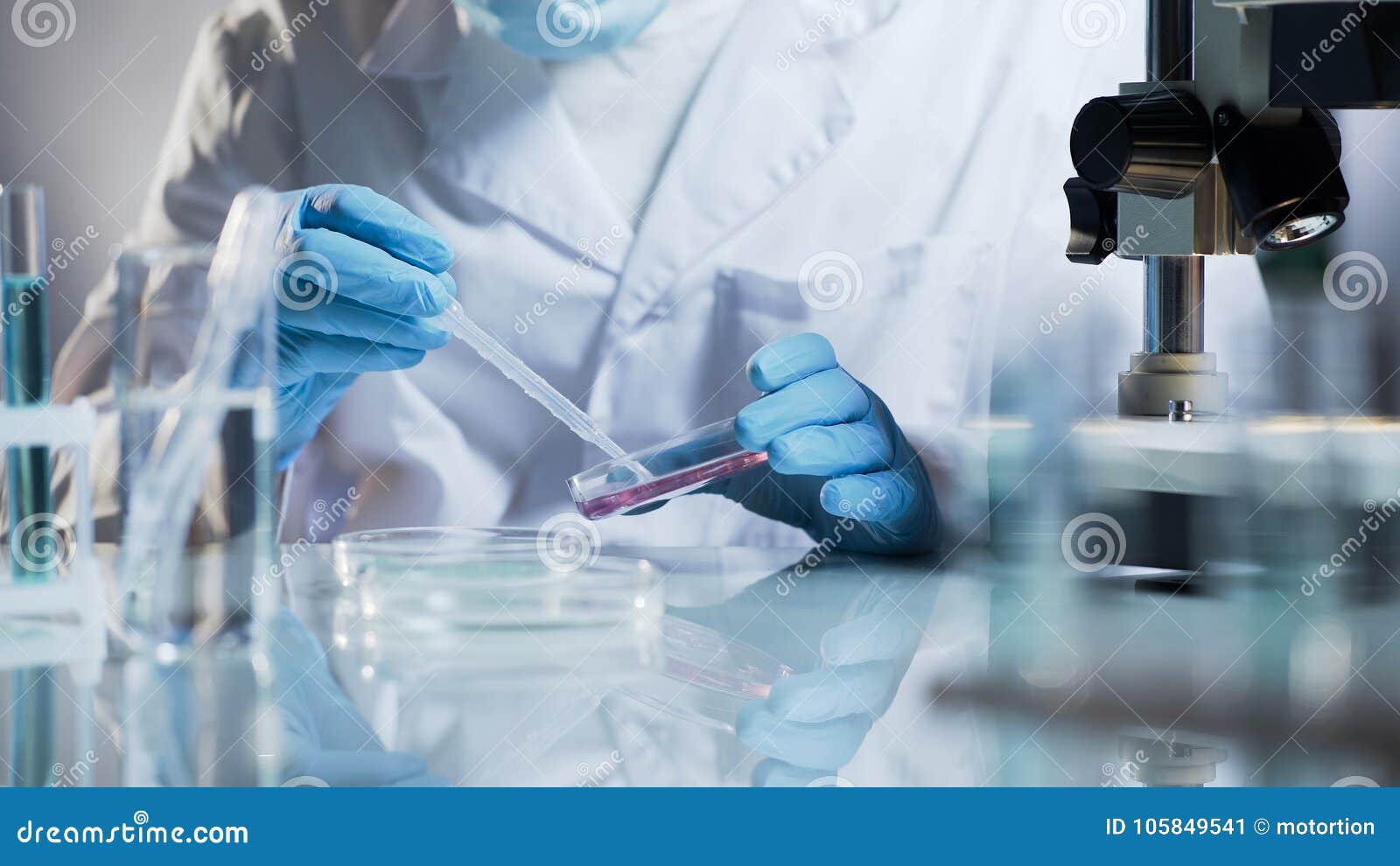 Lab Technician Checking Material by Creating Chemical Reaction with