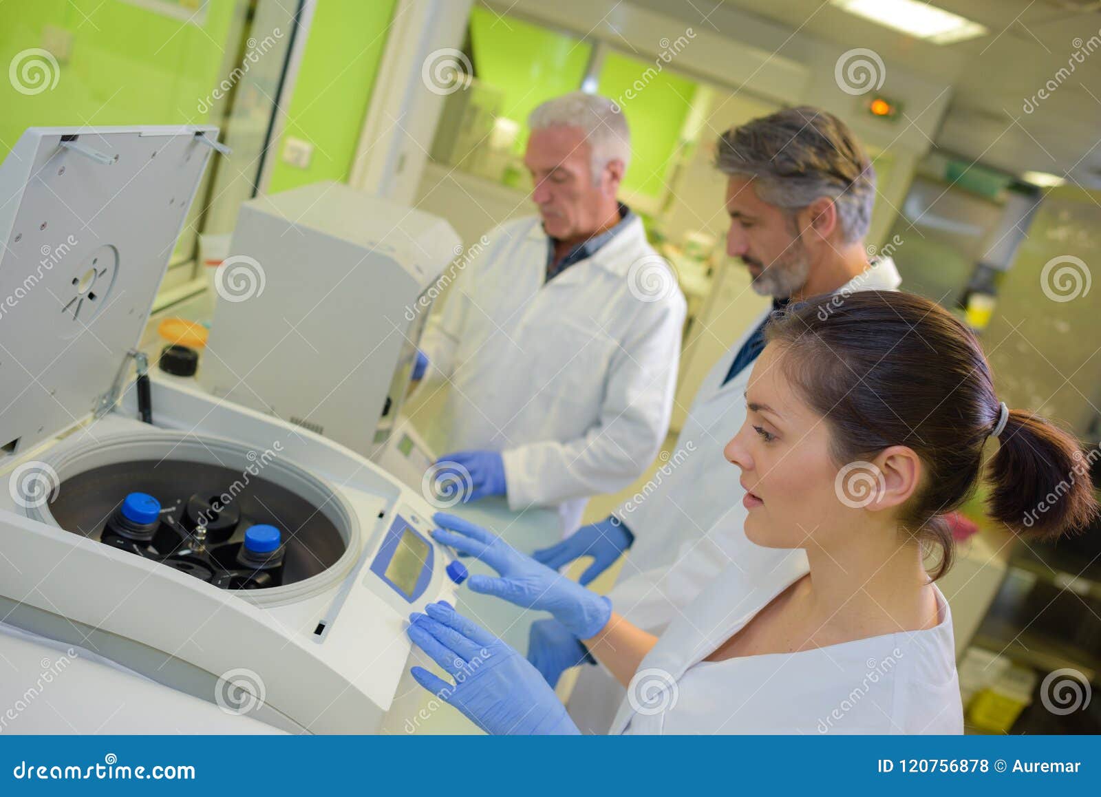 Lab Technician Using Centrifuge Machine Stock Photo Image of