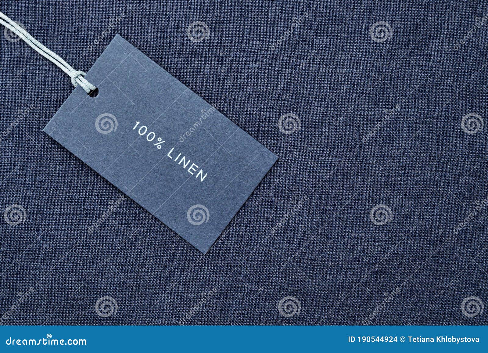 Label with Composition of Fabric on Cloth Background. 100 Percent Linen