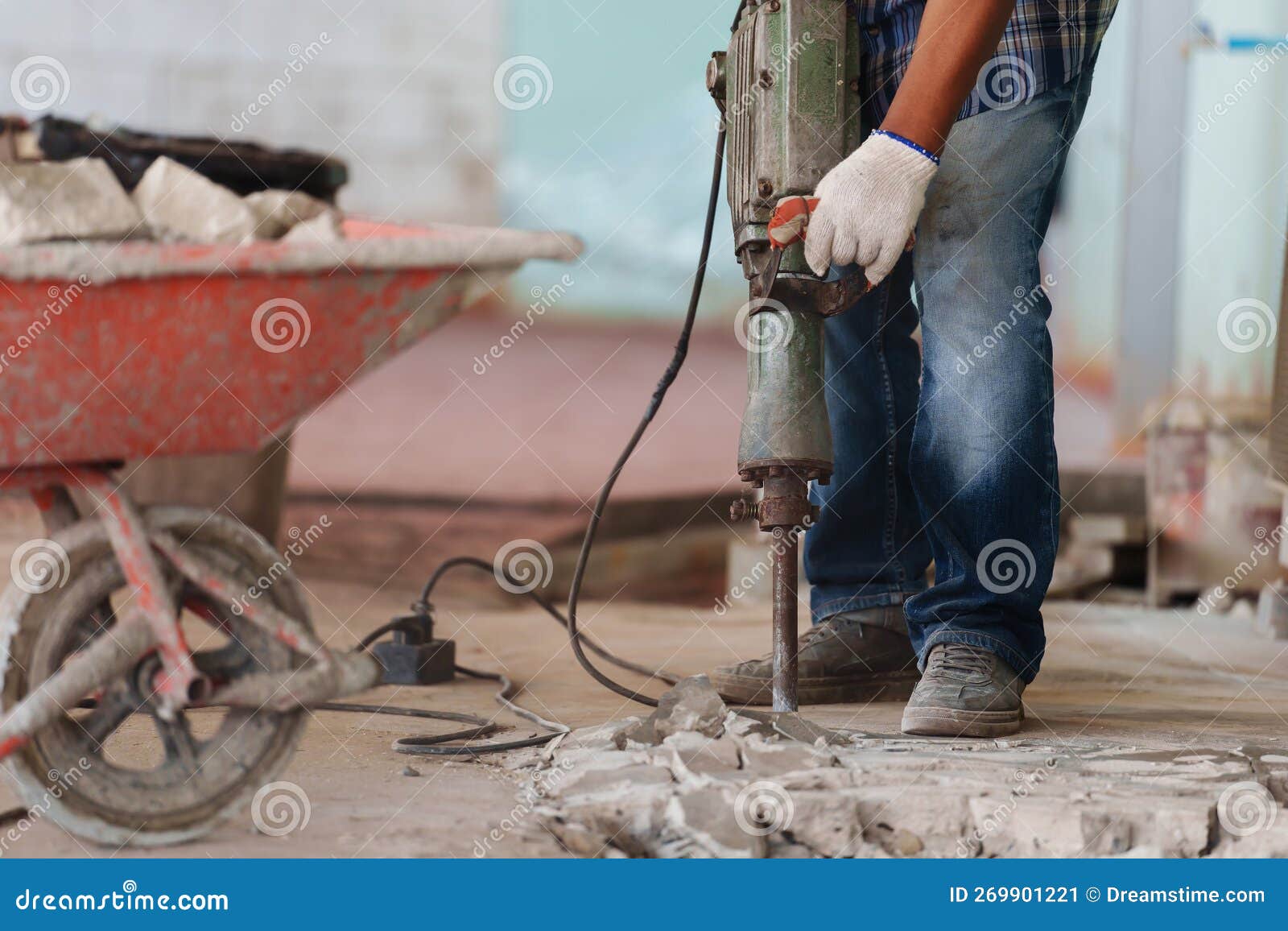 Labor Using a Jackhammer To Break Up Concrete Floor Stock Image Image