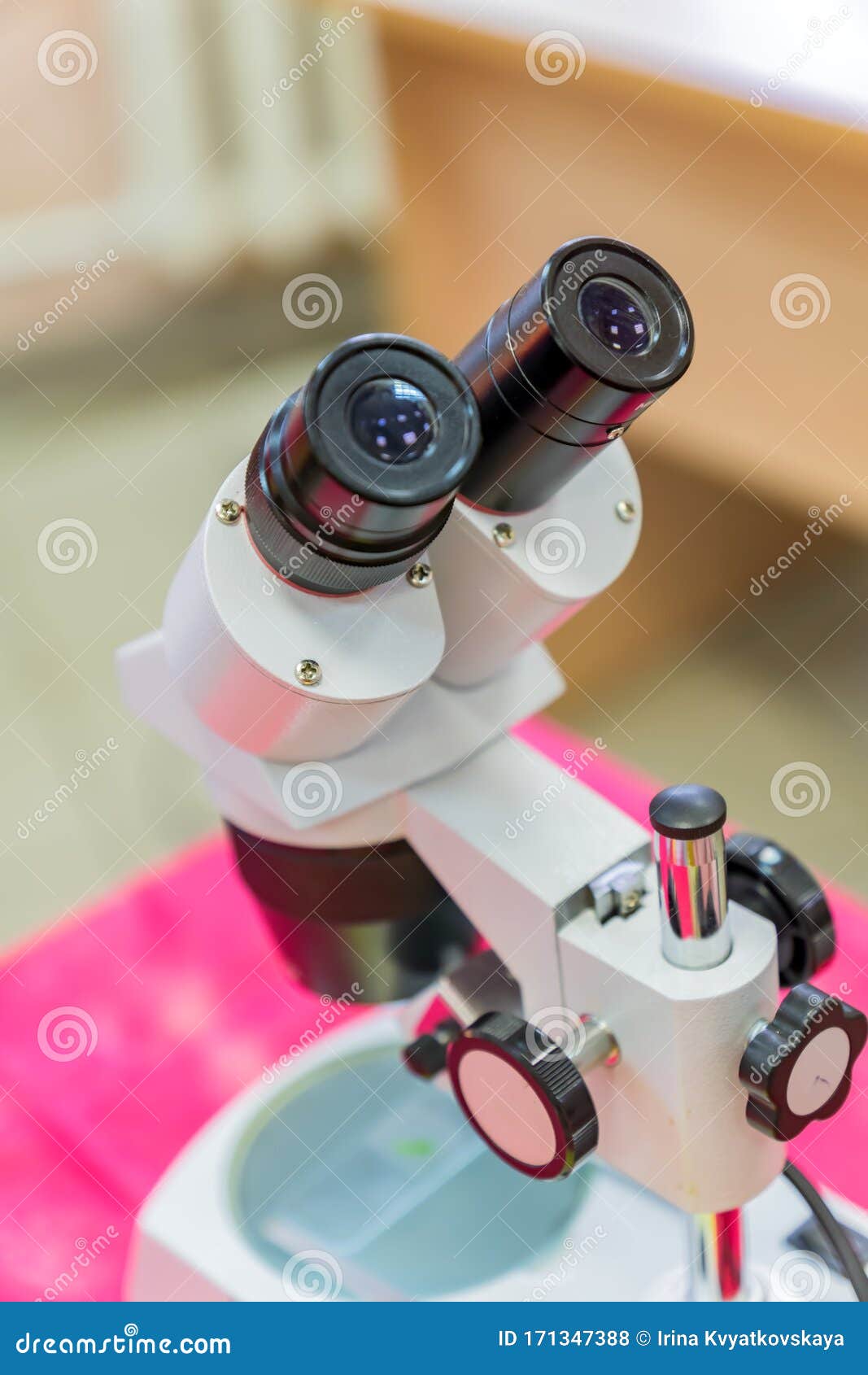 Laboratory Equipment, Optical Microscope for School Lessons on Red