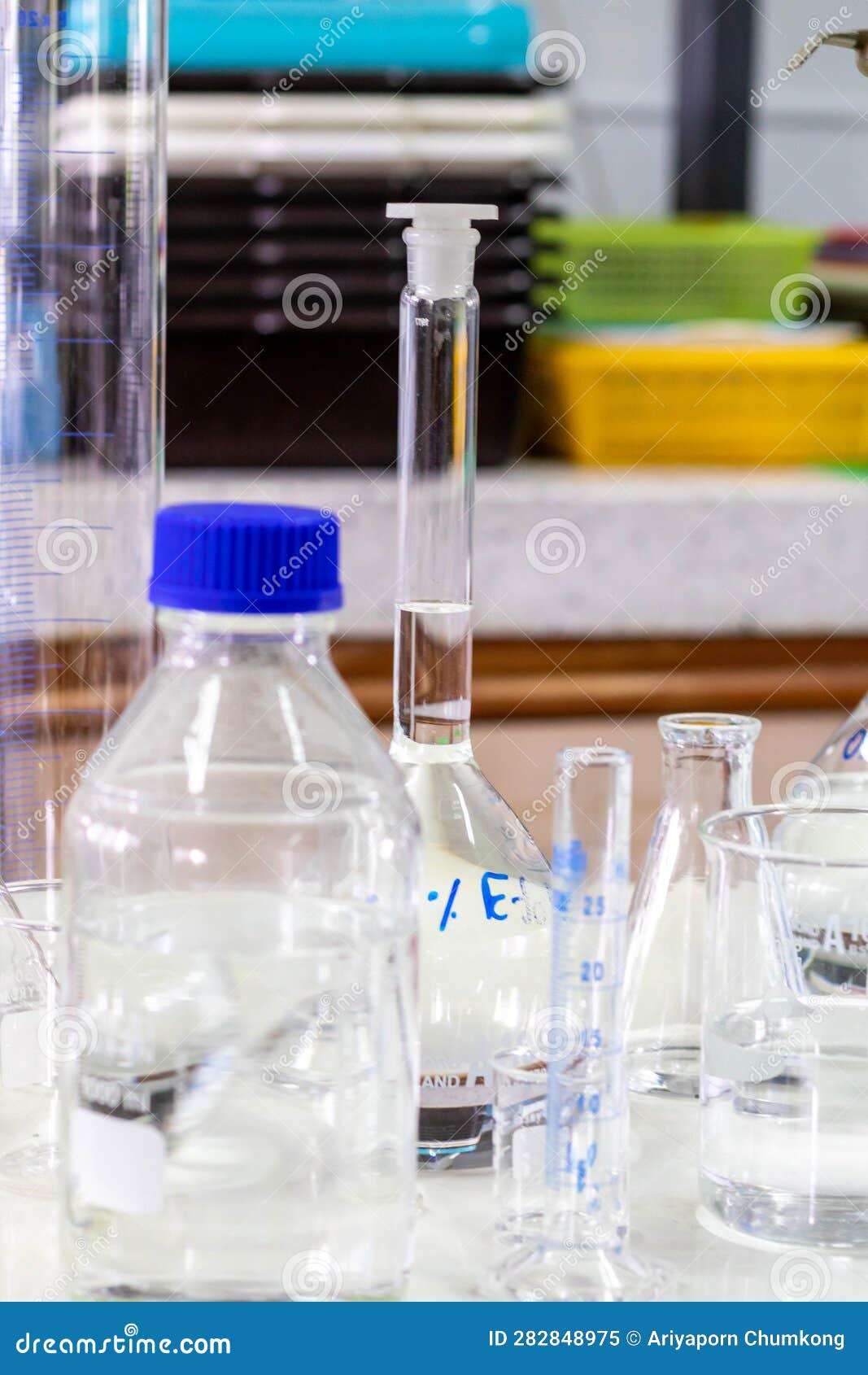 Laboratory Glassware with Green Liquid in a Science Research Laboratory