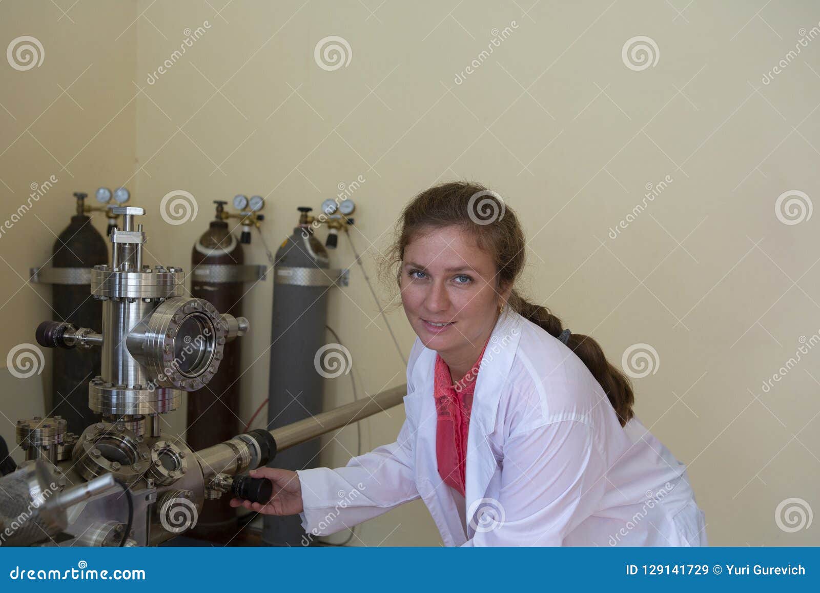 Laboratory Specialist Examines the Data Obtained on a Special Apparatus