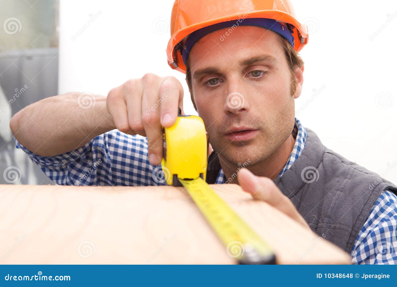 Laborer Working with Measuring Tape Stock Photo Image of helmet