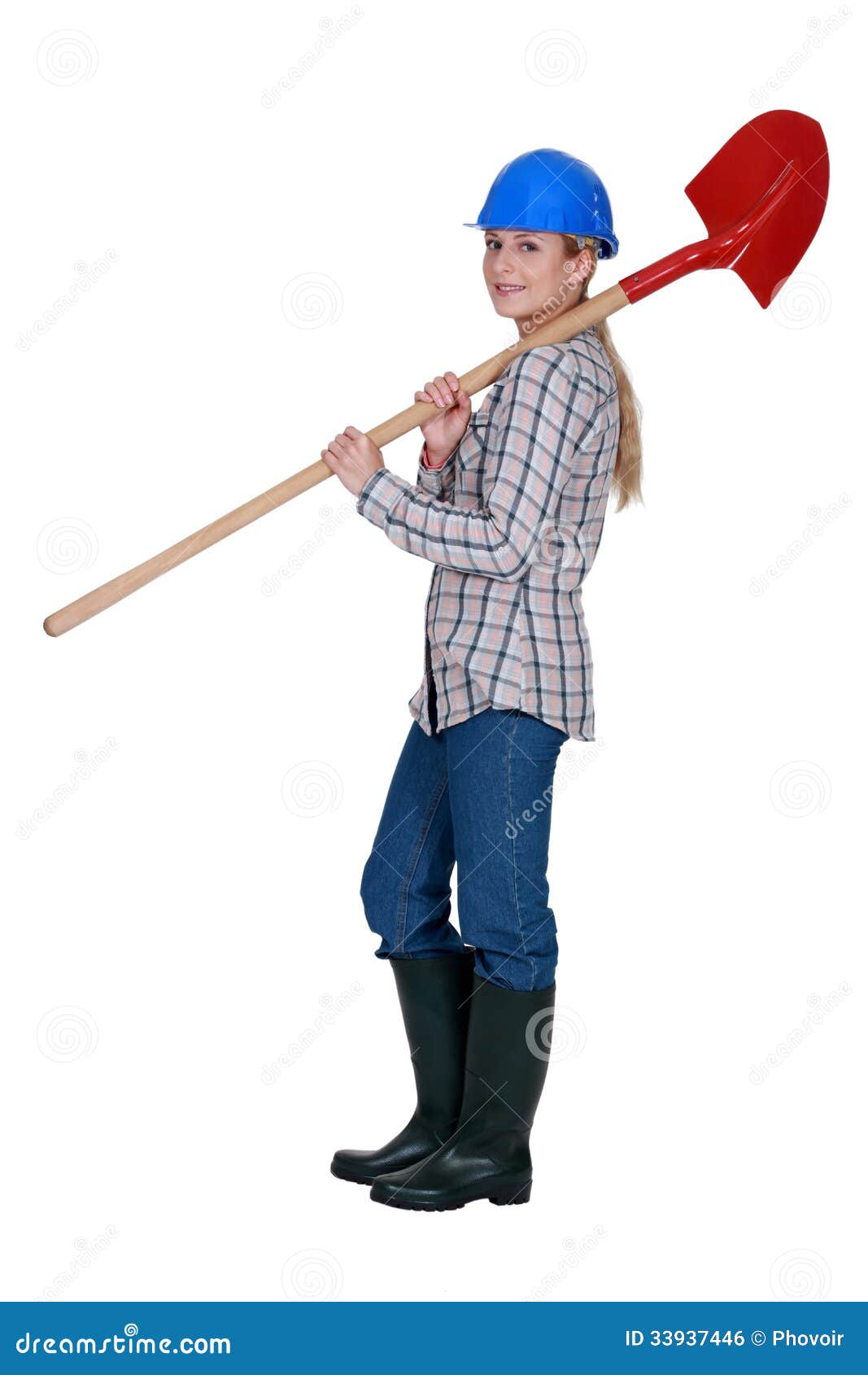 labourer carrying a spade