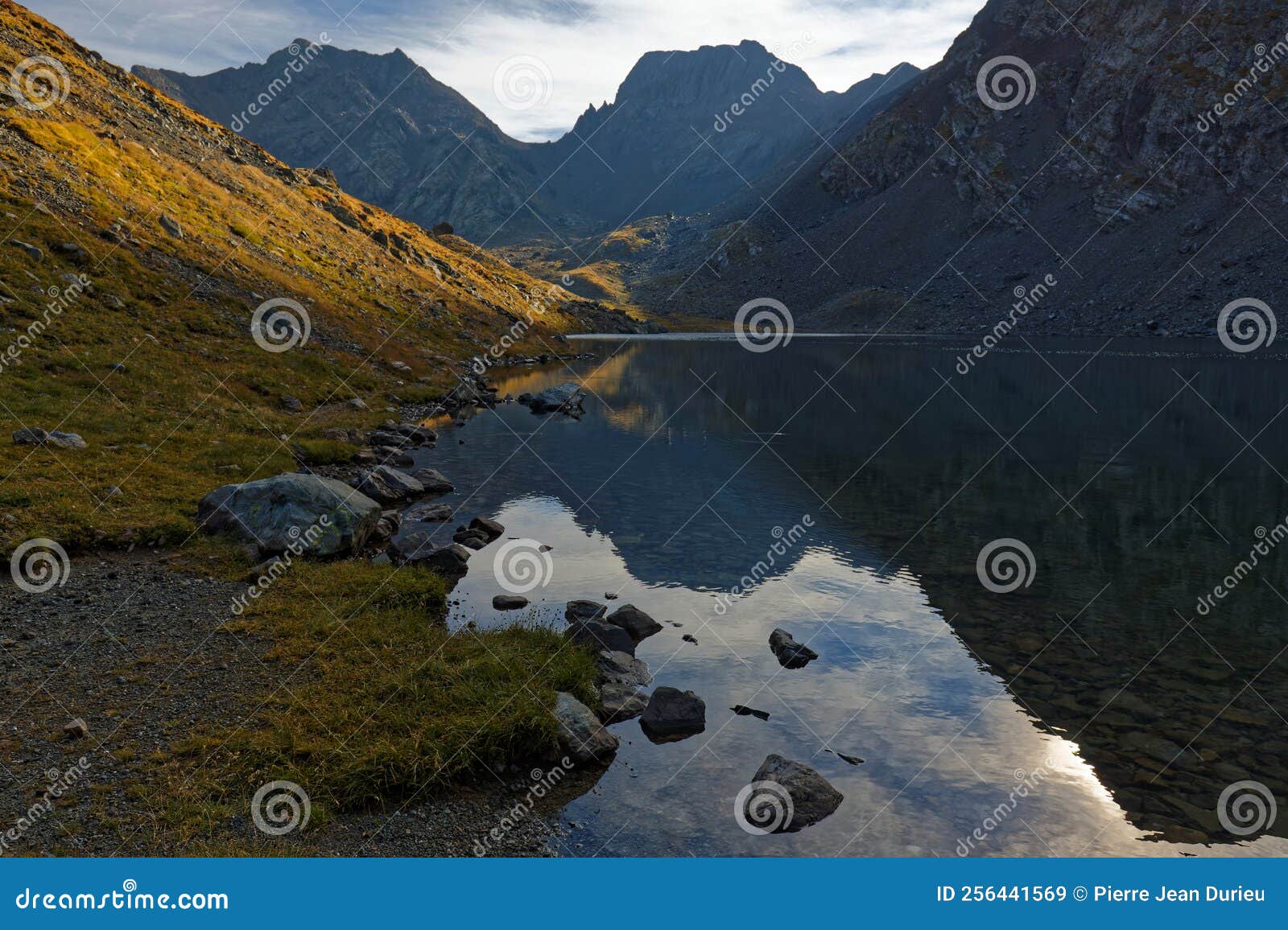 grand domenon lake at the first rays of morning sun