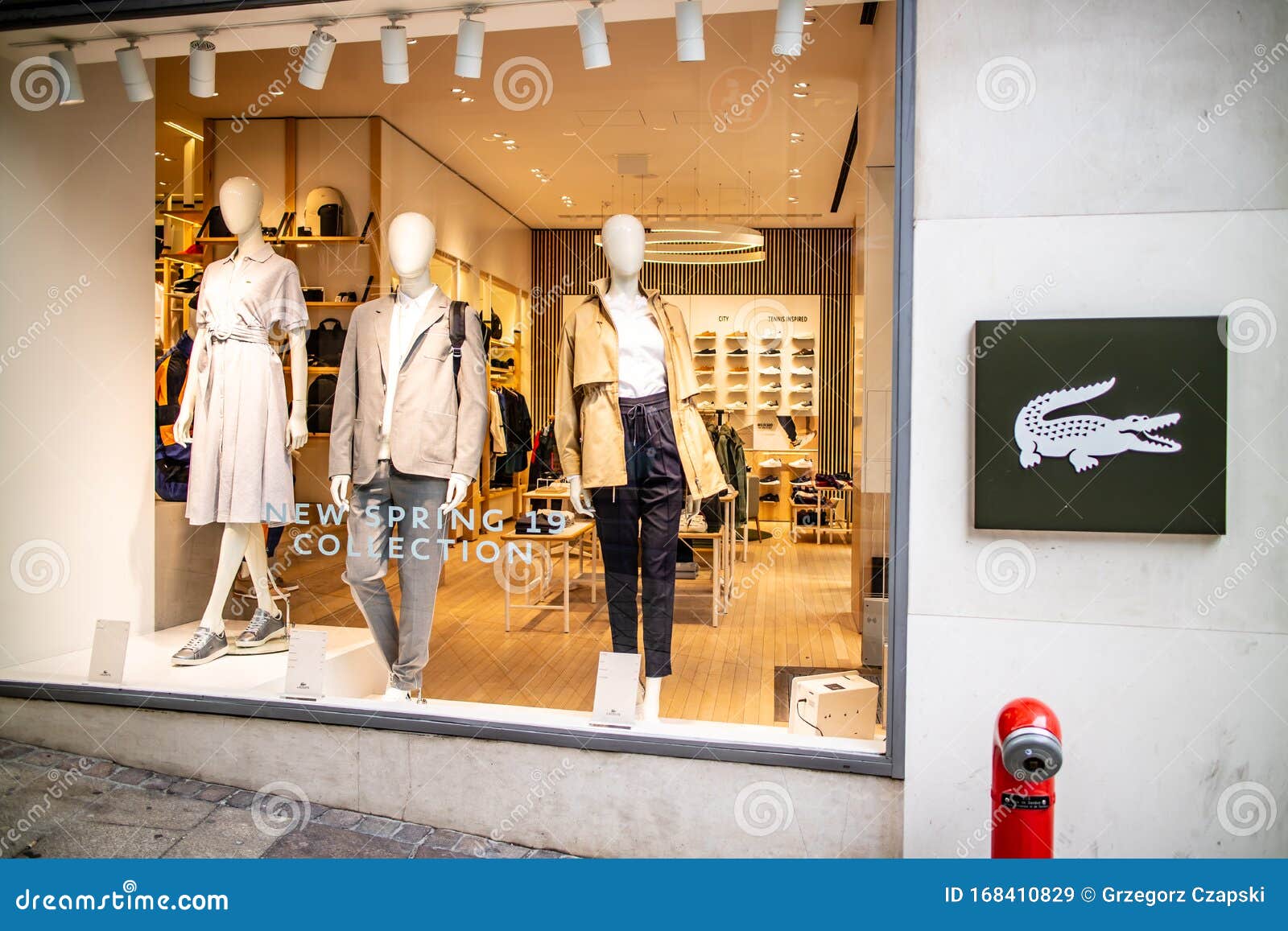Lacoste Store with Fashionable and Luxury Products, Logo, Sign. French  Clothing Company, Founded by Tennis Player Rene Lacoste Editorial Stock  Image - Image of footwear, city: 168410829