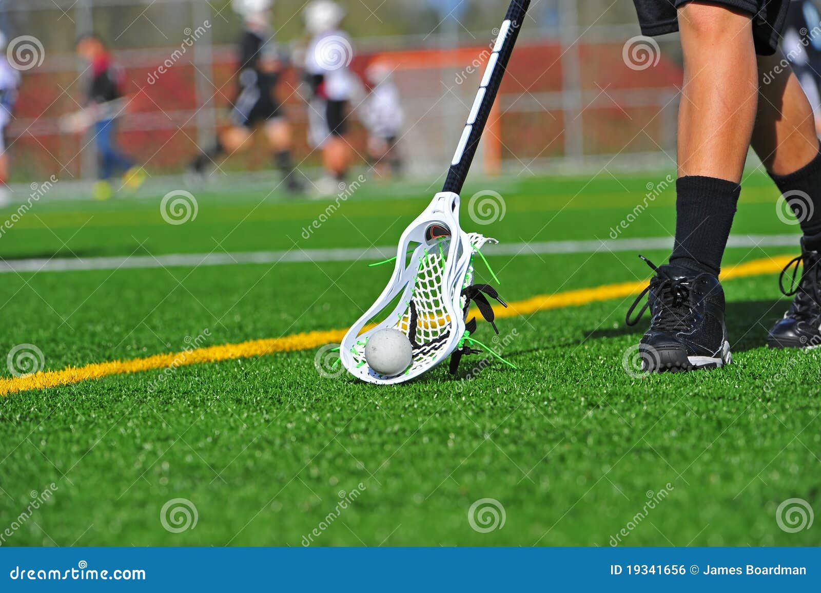 Lacrosse ball pick up stock photo. Image of high, scooping 19341656