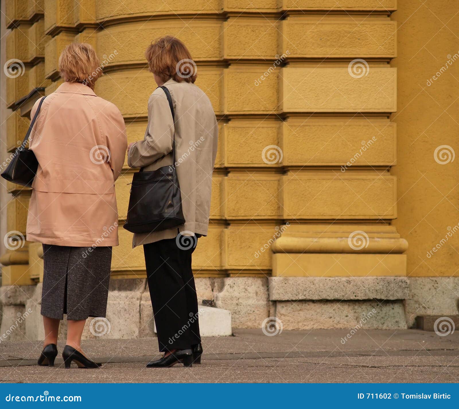 Ladies Chit Chat stock photo. Image of yellow, adult, hair - 711602