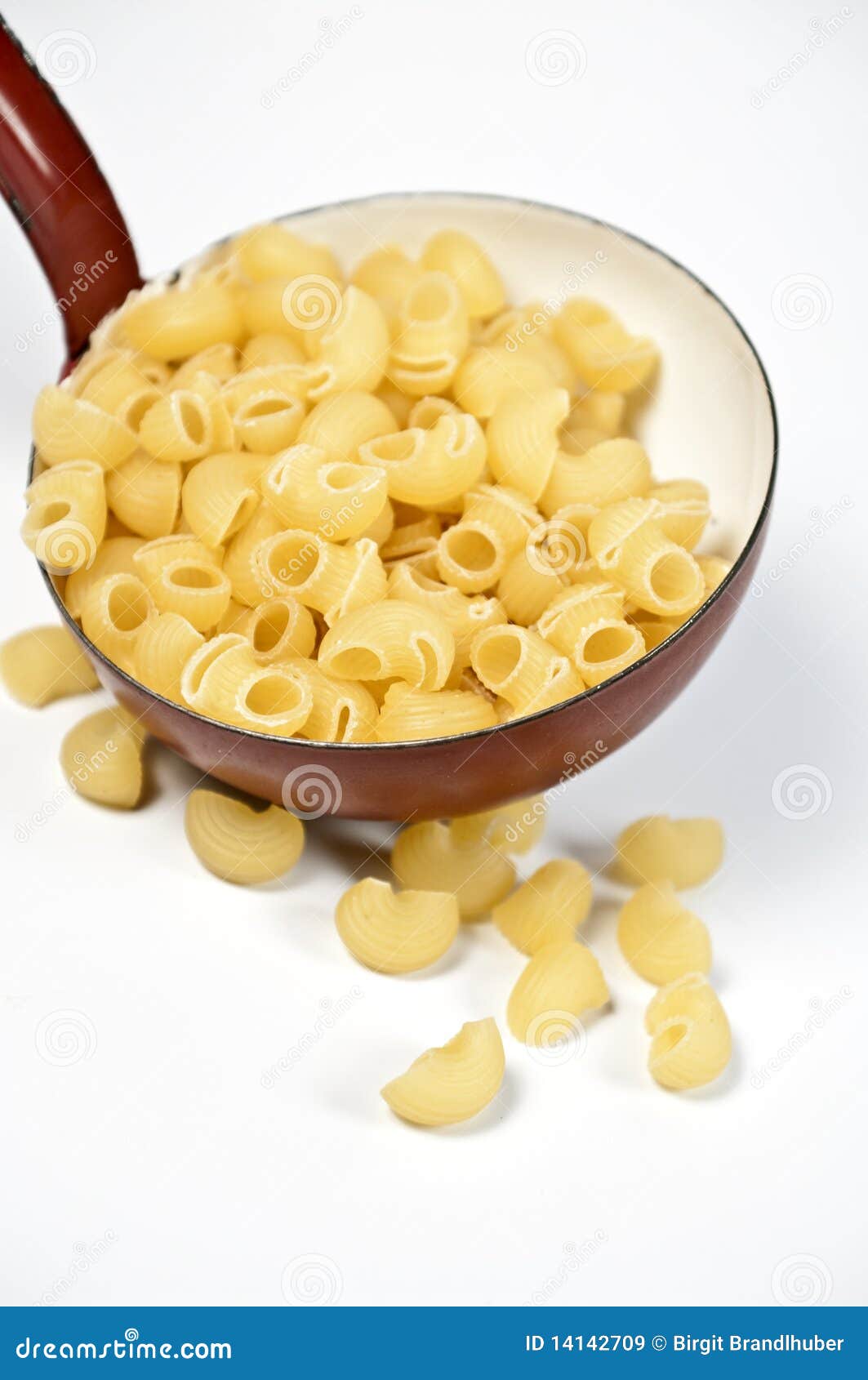 A ladle and pasta stock image. Image of ladle, yellow 14142709