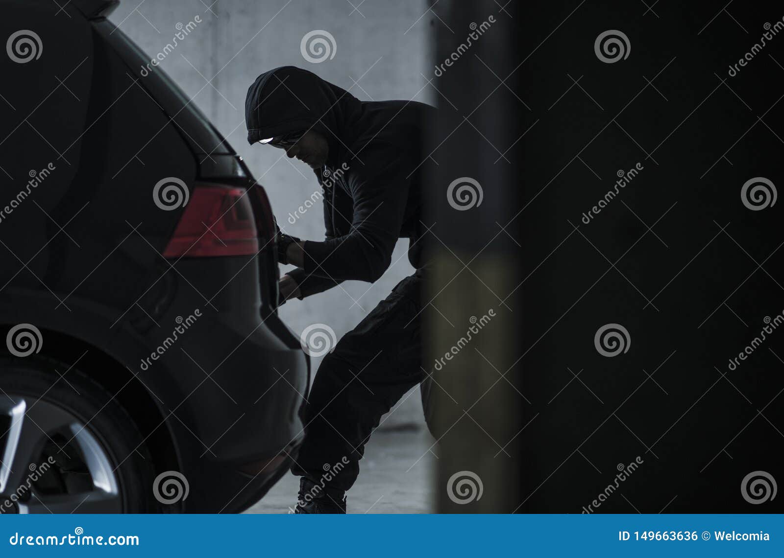 Ladro Di Automobile Stealing Vehicle Fotografia Stock Immagine di