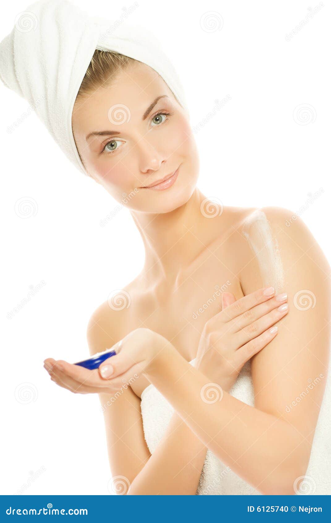 lady applying moisturizer