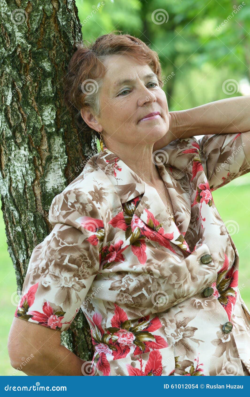 Lady enjoying summer stock photo. Image of looking, mature - 61012054