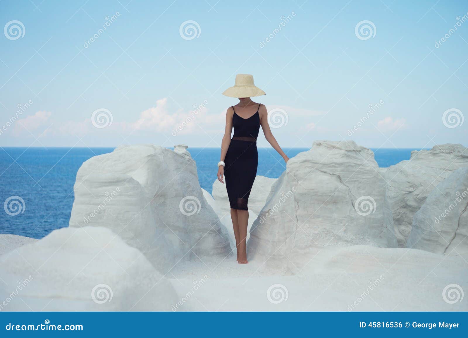 lady in hat in an unusual landscape