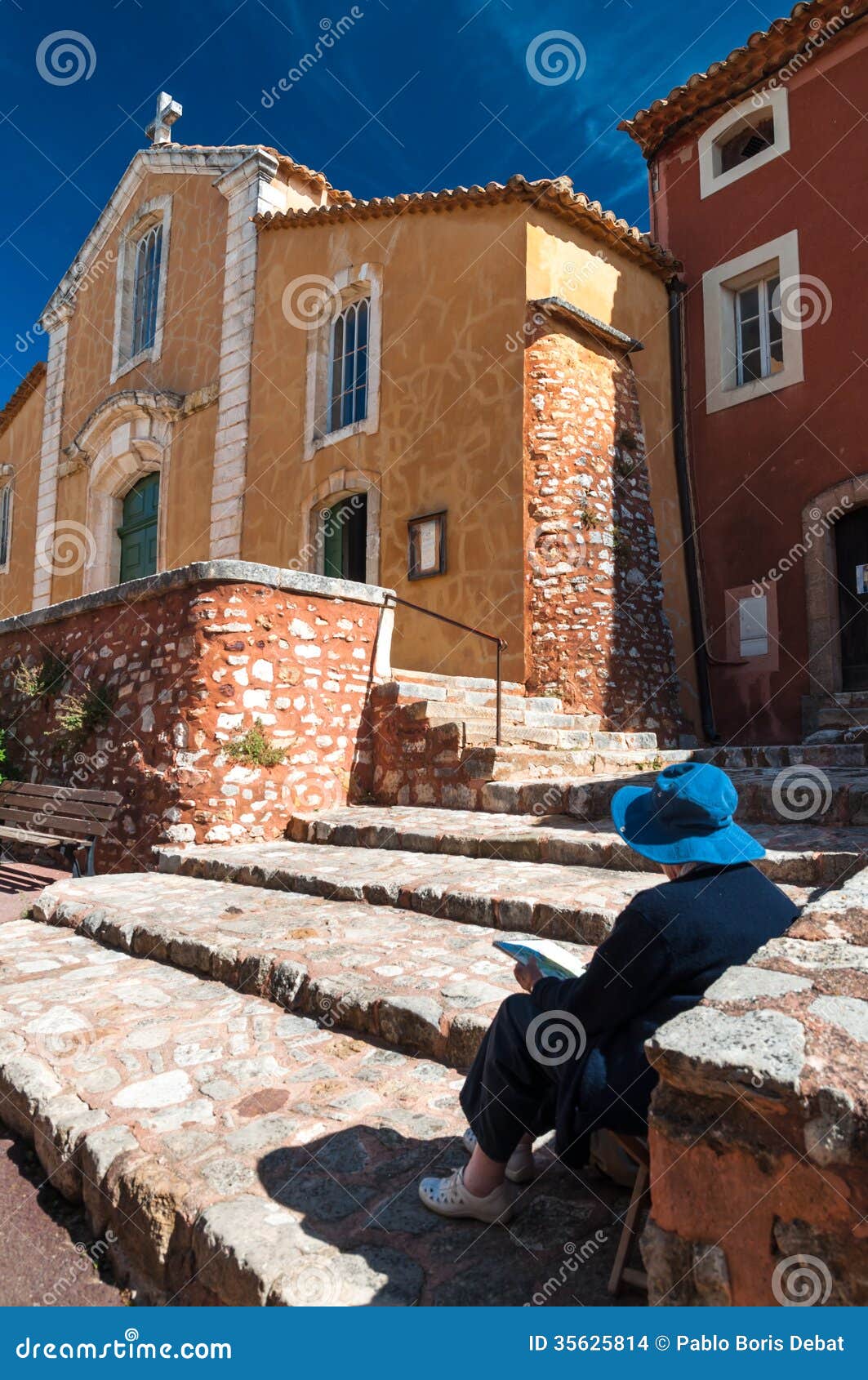 lady painting eglise saint michel fachade at roussillon in franc