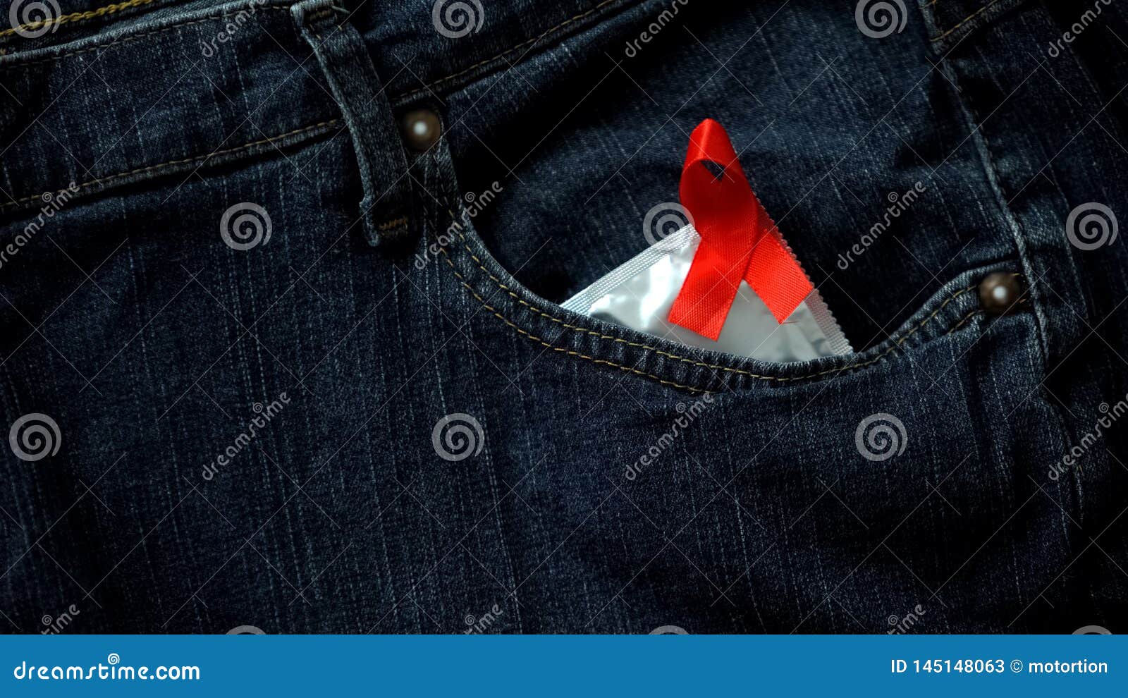 Lady Putting Condom With Red Ribbon In Jeans Pocket Safe Sex Aids Prevention Stock Image