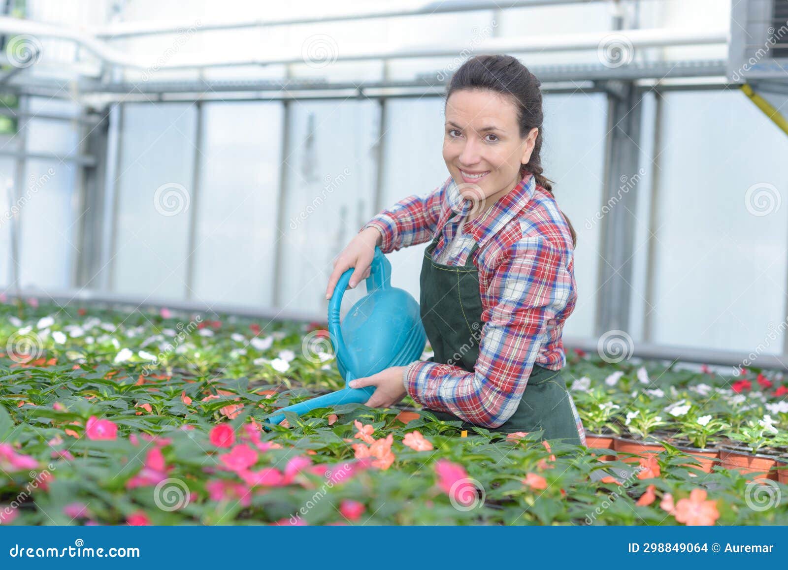 Lady Watering Plants in Garden Center Stock Photo Image of pretty