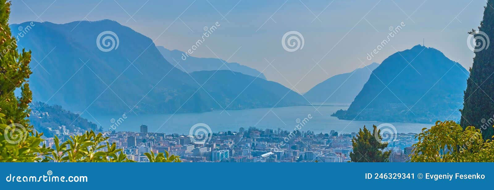 lago di lugano or lugano lake with surrounding alps mountains, switzerland