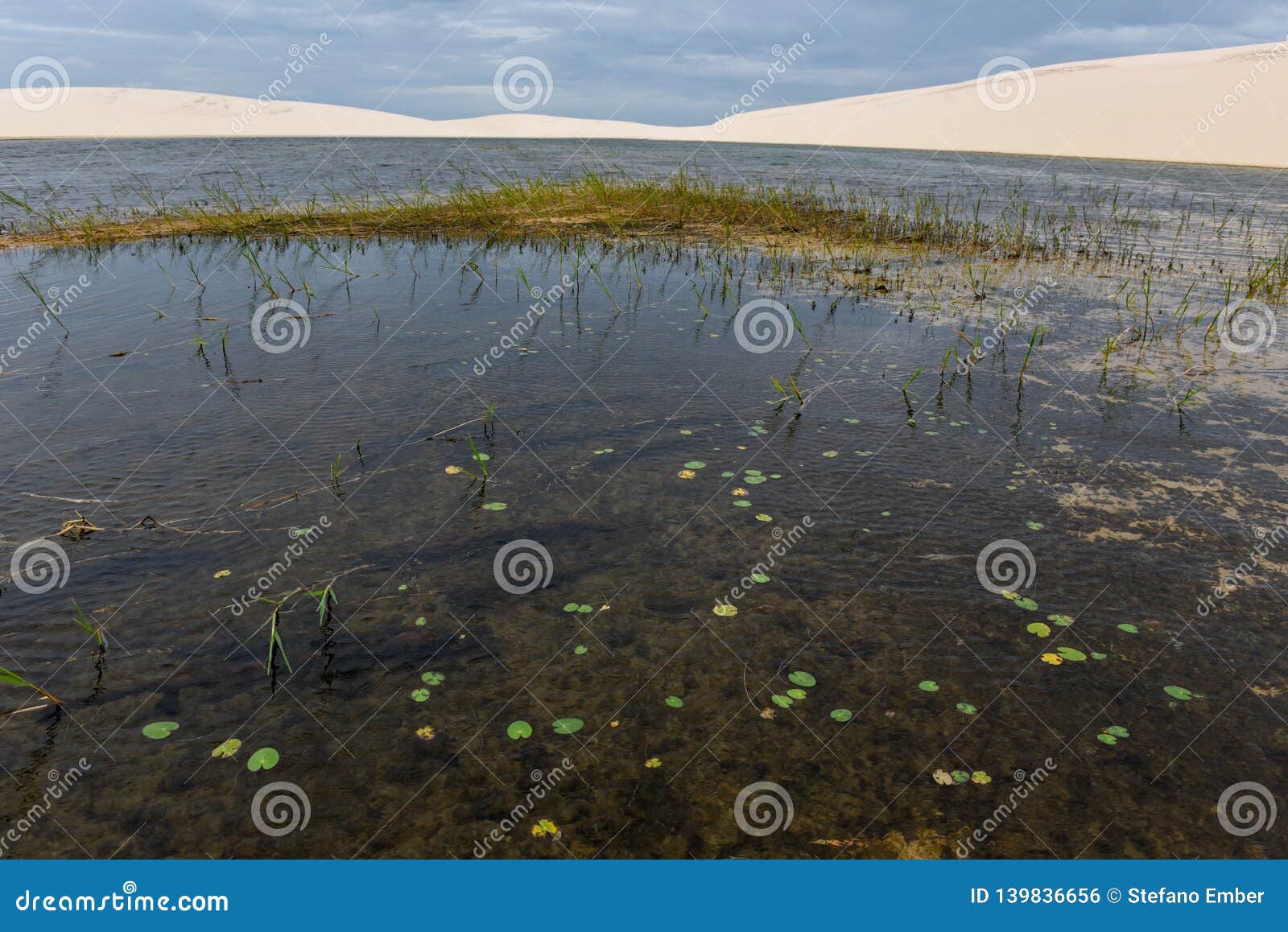 lagoon on the middle of the dunes at lencois maranhenese national park, brazil