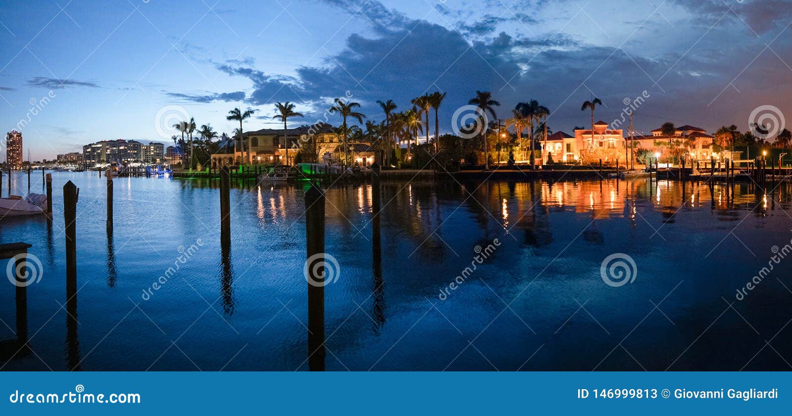 lake boca raton and city skyline with reflections at sunset, panoramic view